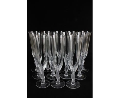 A set of twelve Igor Carl Fabergé crystal champagne flutes, the frosted stems modelled as two kissing doves, all with origina