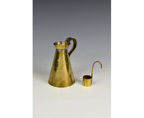 A Georgian brass Navy rum or grog measure, half pint, of typical pitcher form, having cut-out slot section to lip, stamped wi
