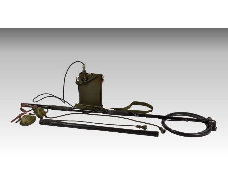 A British Army mine detector, with control box and headphones, marked MD2000.