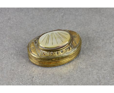 A 19th century brass snuff box with mother of pearl inset lid, of kidney shaped form, the top engraved with foliate design ha