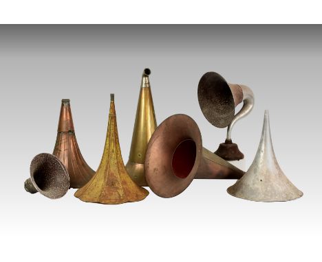 A small collection of various gramophone and phonograph horns for restoration, to include large copper version having a paint