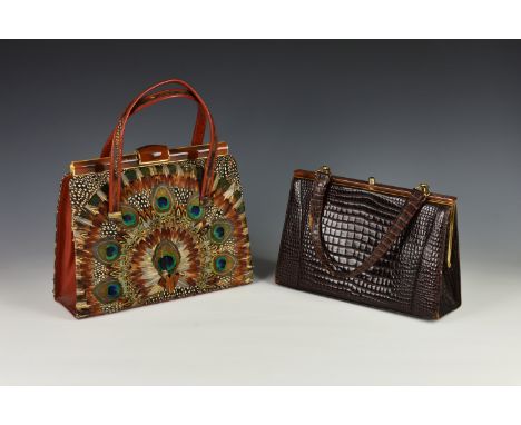 Two vintage 1950s-1960s handbags, one red faux-leather with peacock feather decoration to the exterior and twin loop handles,