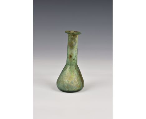 A Roman iridescent pale green glass unguentarium, 1st-2nd century AD, with flat, everted rim, slender neck and conical body, 