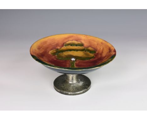 A Moorcroft Tudric tazza in Eventide pattern, c.1920, tubelined and glazed, impressed 'Made in England TUDRIC MOORCROFT 01358