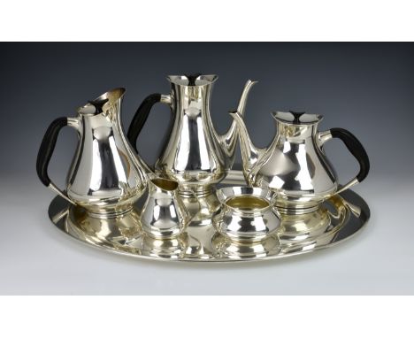 A Danish modernist EPNS five piece tea and coffee service and tray, by Cohr, comprising of a teapot, coffee pot, hot water ju