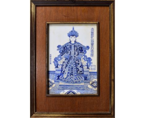 A pair of Chinese porcelain portrait plaques of the Qianlong Emperor and Empress, with Guangxu four character mark, probably 