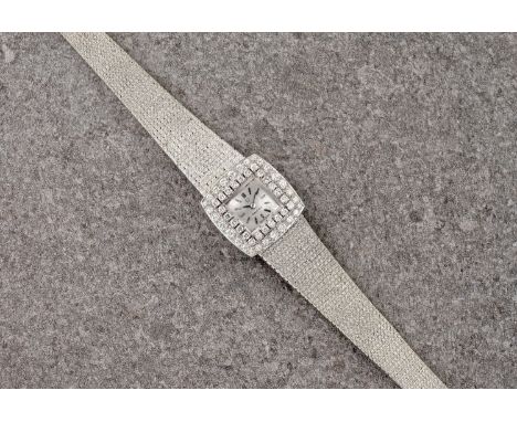 A ladies 18ct white gold and diamond Omega dress watch, the inner caseback numbered '8177' and 'A53401', with signed rose gol