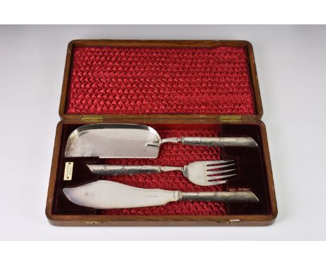 A cased set of three silver plate fish servers, early 20th century, retailed by Hardy Bros, Sydney, comprising of fish server