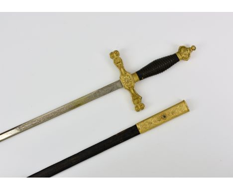 A decorative Spanish sword, the 74cm. blade, part chased and engraved with foliate and scroll design, having makers mark " TO