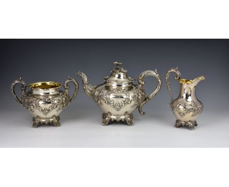 A Victorian silver three piece tea service - overstamped by J. Le Gallais of Jersey, hallmarked with maker's mark under lid, 