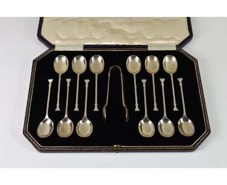 A set of twelve Art Deco silver teaspoons & sugar tongs in original fitted case, Cooper Brothers & Sons Ltd, Sheffield, 1925,