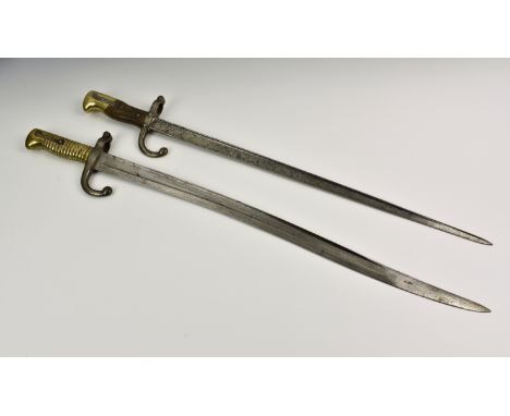 Two French 19th century bayonets, comprising of M1874 Gras Epee bayonet, dated and inscribed " Mre d' Armes de St. Etienne 18