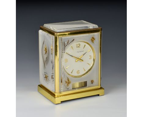 A Jaeger-le-Coultre Atmos Aquarium clock, the gilt brass case glazed with opaque perspex panels containing gilt angel fish, s