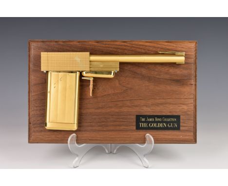 JAMES BOND - The Golden Gun replica film prop, a copy of the famous Golden Gun used by villain Francisco Scaramanga in The Ma