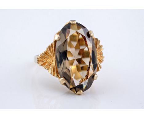 A 9ct gold and smoky quartz dress ring, size L.