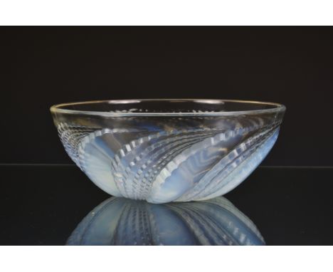 A Rene Lalique opalescent and clear glass Fleurons Bowl, with spiralled decoration, etched 'R. LALIQUE FRANCE' marks to the b