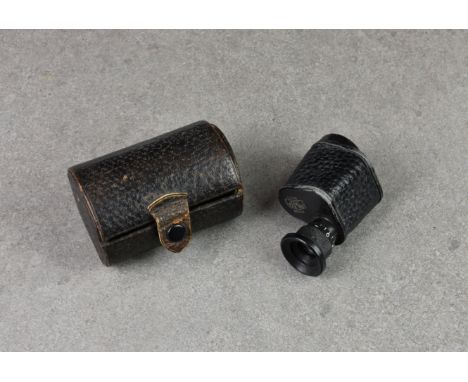 A vintage leather cased Carl Zeiss Jena Monocular, adjustable 4x20, no. 919039, 2 ¾in. (7cm.) long. * Condition: Working, rub
