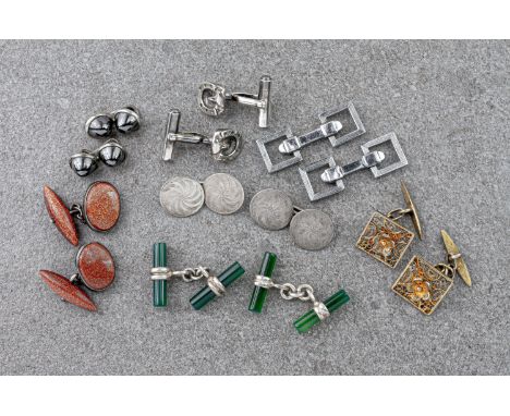 A collection of vintage and modern silver cufflinks, including three chain link pairs with chrysoprase, hematite and red aven