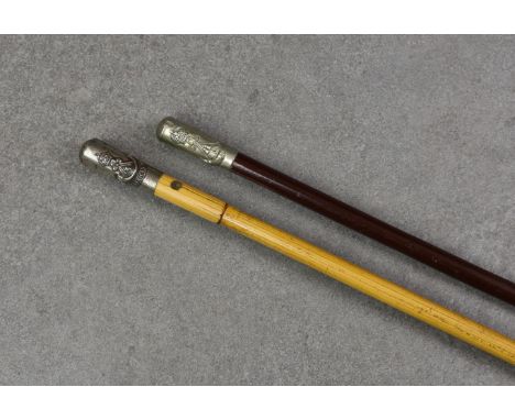 Two military swagger sticks, comprising of a WW2 British Officers bamboo swagger stick topped with white metal finial marked 