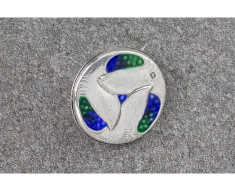 An Archibald Knox for Liberty & Co Arts & Crafts ' CYMRIC ' silver and enamel brooch, Liberty & Co, Birmingham, 1905, circula