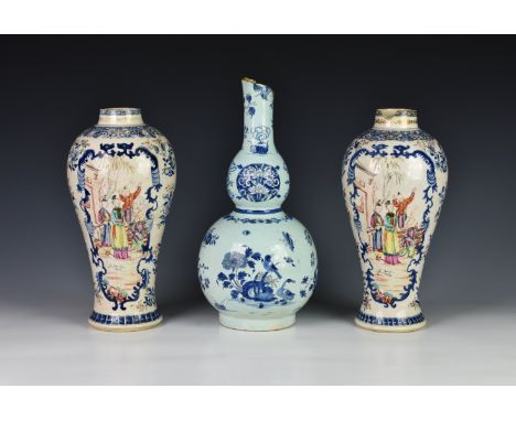 A pair of English enamelled creamware chinoiserie vases, late 18th / early 19th century, possibly Lowestoft, of baluster form