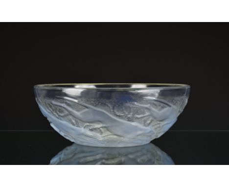 A Rene Lalique Chiens bowl, opalescent blue clear and frosted glass, moulded 'R. LALIQUE' and etched 'France' marks to the in