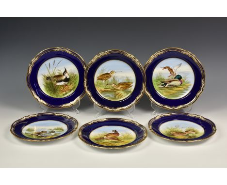 A set of six Spode 'Game Birds' cabinet plates, the hand painted design with blue border and gilt rim, to include Lapwing, Ma