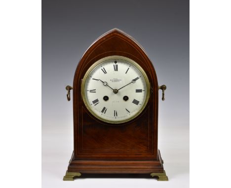 A late 19th century inlaid mahogany lancet mantel clock, with Roman dial, signed 'Examd. by W. A. Watkins, 59, Carey St., Lon