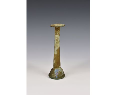 A large Roman iridescent glass unguentarium, 1st-2nd century AD, of candlestick form with widely flared, flat, folded rim, a 