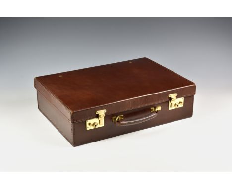 A fine quality leather attache case by Papworth of Cambridge, with brass fitments and dark green leather interior, 18 x 13 x 