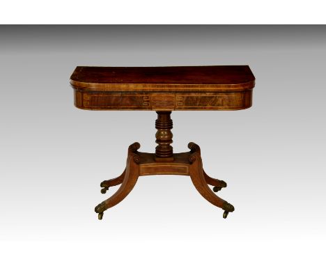 A George IV inlaid mahogany D-shaped foldover card table, the rosewood cross banded top lined with green baize, over an ebony