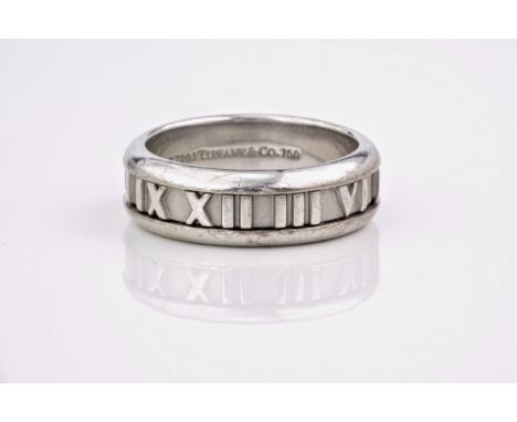 A Tiffany 18ct white gold 'Atlas' ring, hallmarked 'ATLAS © 2003 TIFFANY &amp; CO. 750', the brushed and polished gold band w