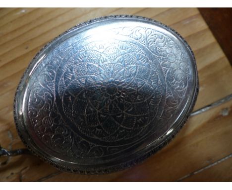 A white metal Eastern snuff box with repeating scrolling design together with a Chinese export \wang Hing white metal specime