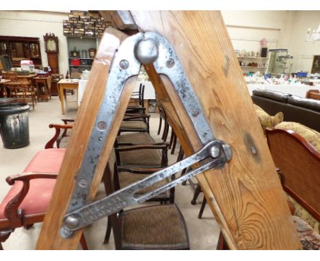A set of vintage six tread kitchen step ladders with a safety patent hings and pierced metal corner brackets