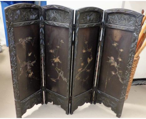 A 4-fold Chinese black lacquered firescreen with inlaid abalone decoration