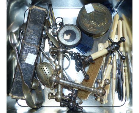 A wax seal in embossed brass case; a pocket compass; 2 pairs of silver plated carver rests; cutlery and manicure items etc