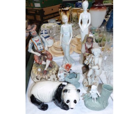 A Royal Doulton figure:  "Enigma", HN 3110; a Melba panda; a Capodimonte style group; other figures