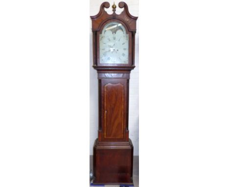 An early 19th century crossbanded mahogany clock with ball and spire finial, inlaid swan neck pediment and brass mounted colu