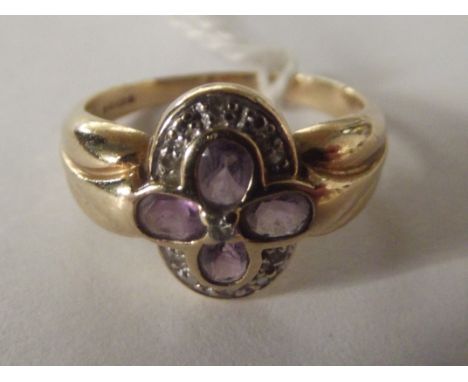 9 carat gold dress ring set with amethyst and diamonds, size P