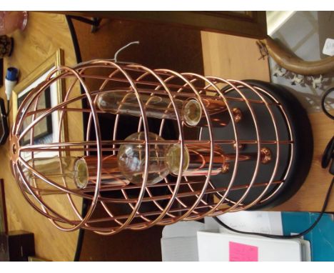 Copper table lamp in the form of a cage