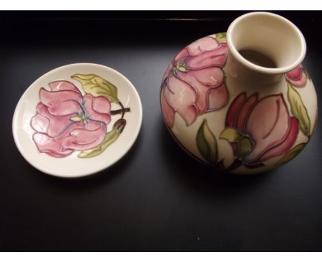 Large Moorcroft squat vase together with a Moorcroft pin dish, each in the Coral Hibiscus pattern against an ivory ground