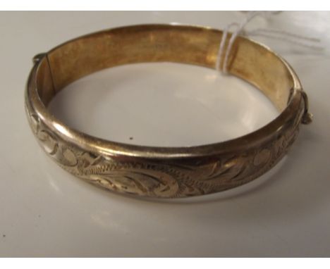 Silver hallmarked bangle, gilded with engraved decoration