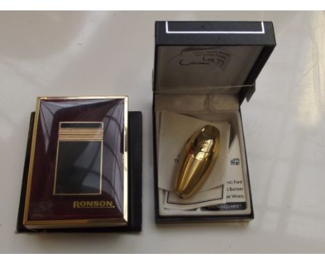 Calibra cigarette lighter together with a Ronson lighter