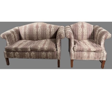 Chippendale style sofa with serpentine back and out scroll arms upholstered in patterned damask, and a matching chair on squa