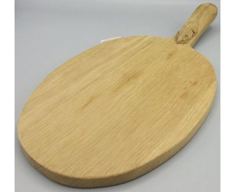 Robert Mouseman Thompson of Kilburn - an oak oval cheese board, curved handle carved with signature mouse, L39cm 