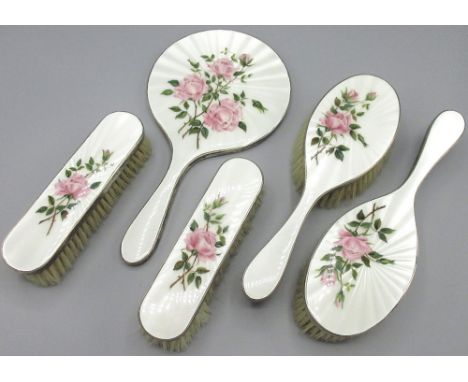 Elizabeth 11 silver and enamel five piece dressing table brush and mirror set, decorated with pink Roses on a white ground, m