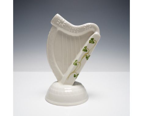 Decorative Irish harp-shaped figure crafted by Donegal Belleek, a subsidiary line of the renowned Belleek Pottery founded in 