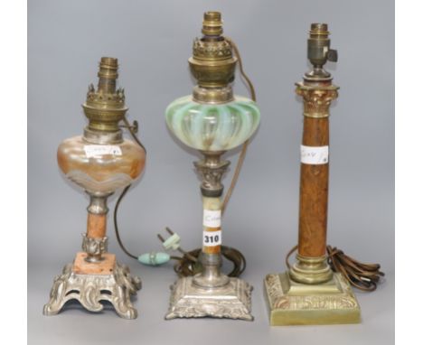 Two oil lamps and one corinthian column lamp