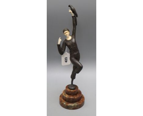 An Art Deco style bronze and faux ivory figure height 39cm