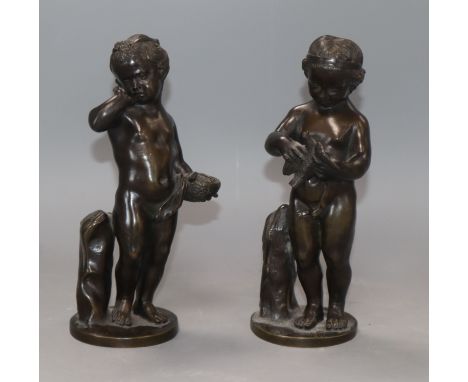 A pair of French bronze putti height 19cm